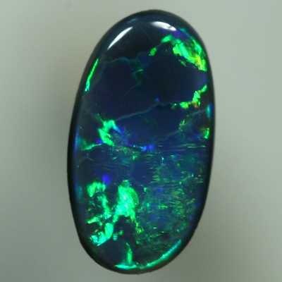 SOLID BLACK OPAL Bright green jumping brightly